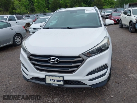 2016 Hyundai Tucson Limited with VIN KM8J33A23GU215481, listed as a IAAI auction lot 42202341 with 97,693 mi miles. Bid and sale history available at carsss.com. Image 12.