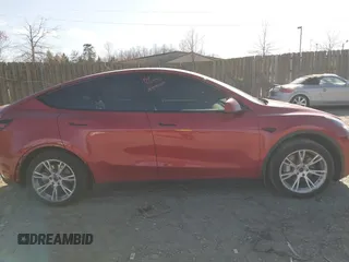 2023 Tesla Model Y Long Range with VIN 7SAYGDEE8PA121218, listed as a IAAI auction lot 41888923 with 34,796 mi miles. Bid and sale history available at carsss.com. Image 14.