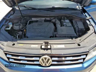 2018 Volkswagen Tiguan SEL z VIN 3VV3B7AX9JM191509, wystawiony jako Copart lot #61357405 z przebiegiem 209 934 mil mil oraz Czysty tytuł • Clean title. Historia ofert i sprzedaży dostępna na DreamBid. Obrazek 12.