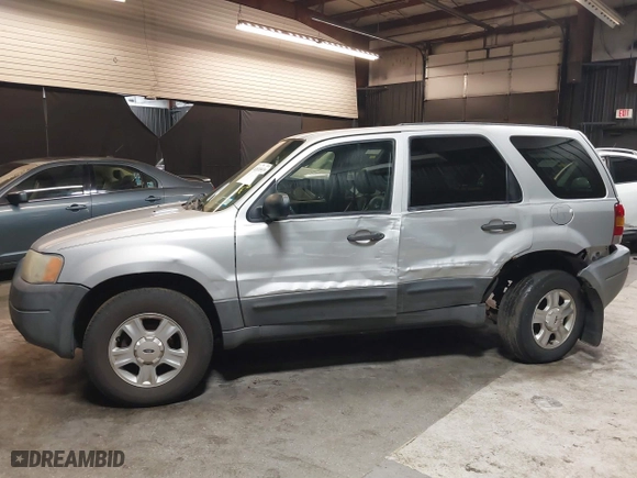 2004 Ford Escape XLT with VIN 1FMYU03164KA95424, listed as a IAAI auction lot 41810929 with 229,539 mi miles. Bid and sale history available at carsss.com. Image 14.