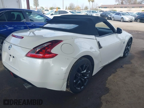 2019 Nissan 370Z Touring with VIN JN1AZ4FH2KM620085, listed as a IAAI auction lot 41533662 with 57,580 mi miles and . Bid and sale history available at DreamBid. Image 4.