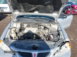 2004 Pontiac Grand Am SE1 with VIN 1G2NF52E54M646874, listed as a IAAI auction lot 41564072 with 97,437 mi miles. Bid and sale history available at carsss.com. Image 10.
