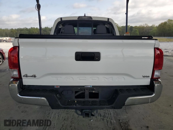 2016 Toyota Tacoma SR with VIN 5TFCZ5AN9GX014233, listed as a Copart auction lot 52016485 with 260,017 mi miles and Salvage Title. Bid and sale history available at carsss.com. Image 6.