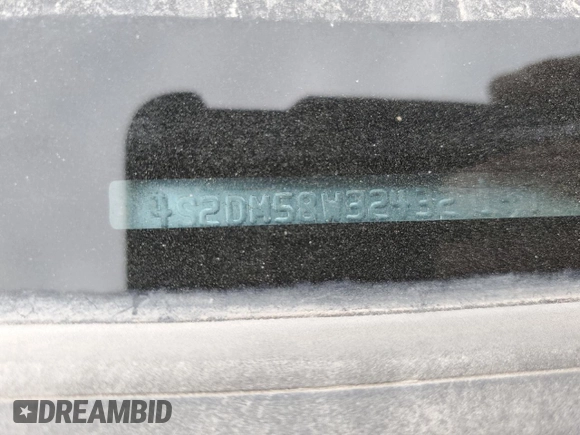 2002 Isuzu Rodeo S with VIN 4S2DM58W324327147, listed as a Copart auction lot 75194104 with Not Provided miles and Salvage Title. Bid and sale history available at DreamBid. Image 14.