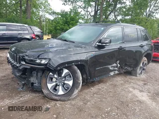 2022 Jeep Grand Cherokee with VIN 1C4RJYB69N8715243, listed as a IAAI auction lot 42319323 with 23,405 mi miles and . Bid and sale history available at DreamBid. Image 6.