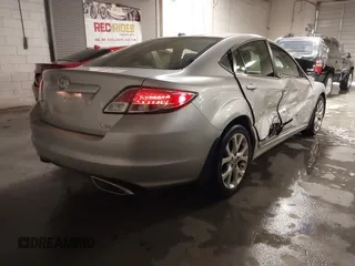 2010 Mazda 6 S Grand Touring with VIN 1YVHZ8CB4A5M08651, listed as a IAAI auction lot 41325049 with 144,834 mi miles and . Bid and sale history available at DreamBid. Image 4.