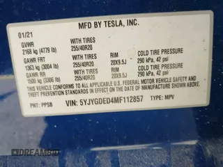 2021 Tesla Model Y Standard Range with VIN 5YJYGDED4MF112857, listed as a IAAI auction lot 41134600 with Not Provided miles and . Bid and sale history available at DreamBid. Image 9.