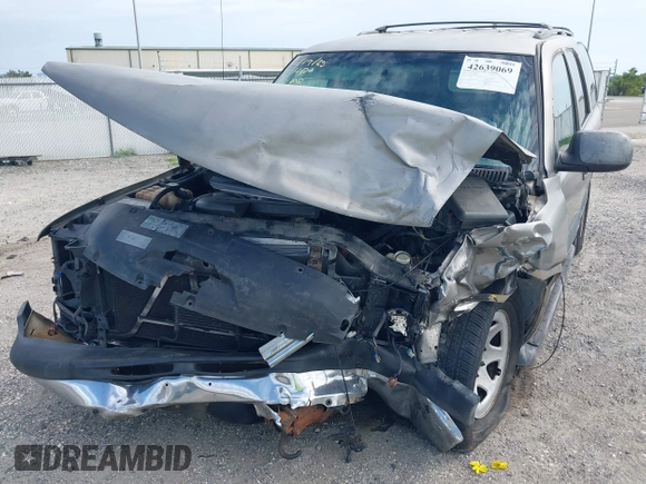 2002 Chevrolet Tahoe LS z VIN 1GNEC13Z72R258244, wystawiony jako IAAI lot #42639069 z przebiegiem Nie podano mil oraz . Historia ofert i sprzedaży dostępna na DreamBid. Obrazek 6.