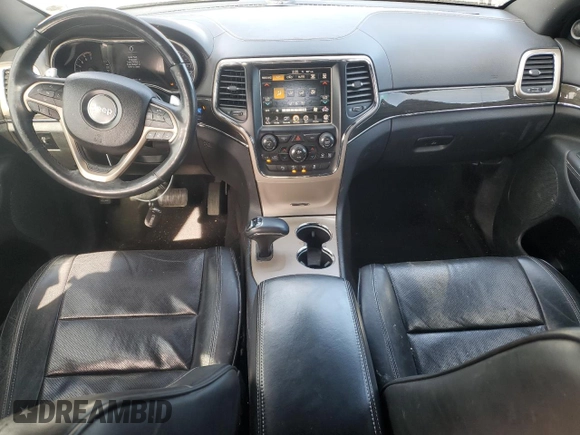 2014 Jeep Grand Cherokee Overland with VIN 1C4RJFCT2EC106002, listed as a Copart auction lot 48763675 with 143,011 mi miles and Salvage Title. Bid and sale history available at DreamBid. Image 8.