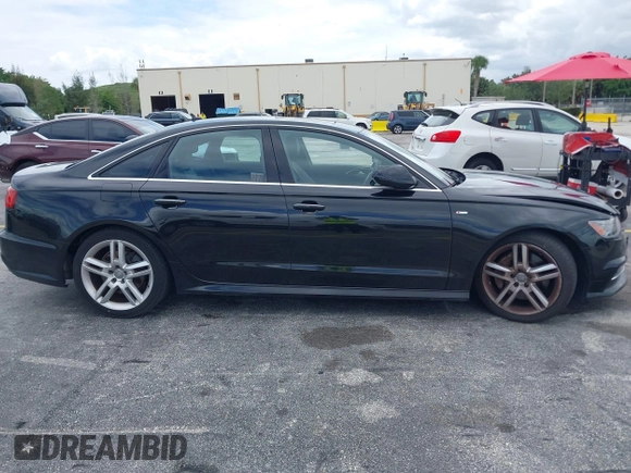 2016 Audi A6 2.0T Premium Plus with VIN WAUGFAFC6GN055826, listed as a IAAI auction lot 42011778 with 98,210 mi miles. Bid and sale history available at carsss.com. Image 13.