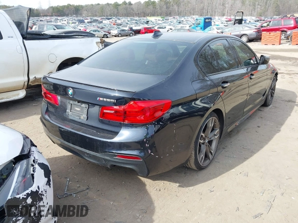2018 BMW 5 Series M550i xDrive with VIN WBAJB9C50JB036400, listed as a IAAI auction lot 41464278 with 139,079 mi miles and . Bid and sale history available at DreamBid. Image 4.