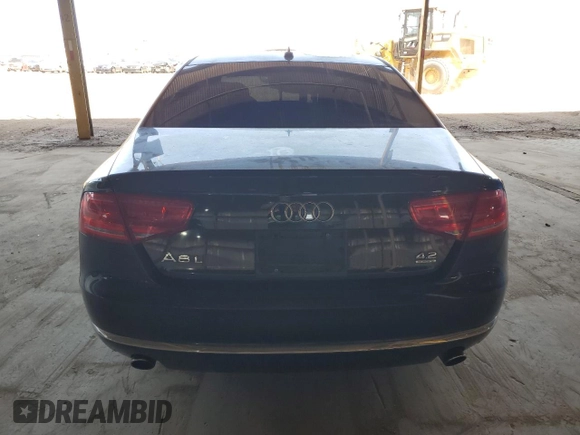 2011 Audi A8 z VIN WAURVAFD5BN019557, wystawiony jako Copart lot #54801035 z przebiegiem 148 688 mil mil oraz Tytuł czysty. Historia ofert i sprzedaży dostępna na DreamBid. Obrazek 6.