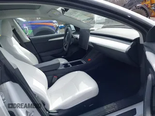 2023 Tesla Model 3 z VIN 5YJ3E1EA8PF671613, wystawiony jako IAAI lot #41737438 z przebiegiem 21 405 mil mil oraz . Historia ofert i sprzedaży dostępna na DreamBid. Obrazek 5.