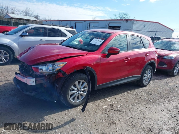 2016 Mazda CX-5 Touring with VIN JM3KE4CY5G0630438, listed as a IAAI auction lot 41877660 with 56,960 mi miles. Bid and sale history available at carsss.com. Image 20.