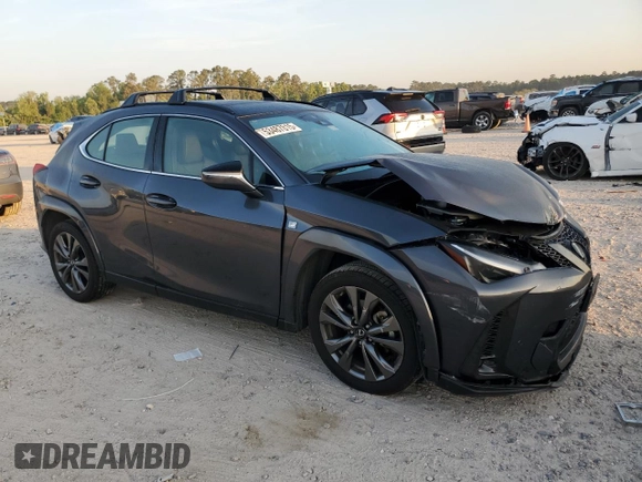2023 Lexus UX 250h F Sport with VIN JTHR6JBH5P2151069, listed as a Copart auction lot 58382515 with 23,114 mi miles and Salvage title. Bid and sale history available at DreamBid. Image 4.
