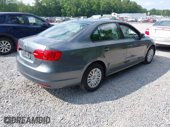 2014 Volkswagen Jetta S with VIN 3VW2K7AJ2EM352047, listed as a IAAI auction lot 42556420 with 104,798 mi miles and . Bid and sale history available at DreamBid. Image 4.