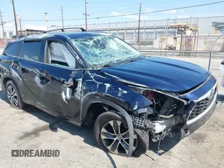 2021 Toyota Highlander Hybrid XLE z VIN 5TDHARAH9MS509001, wystawiony jako IAAI lot #42204842 z przebiegiem 249 623 mil mil oraz . Historia ofert i sprzedaży dostępna na DreamBid. Obrazek 1.