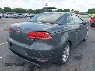 2014 Volkswagen Eos Sport with VIN WVWBW8AH2EV000313, listed as a IAAI auction lot 42333112 with 106,125 mi miles and . Bid and sale history available at DreamBid. Image 6.