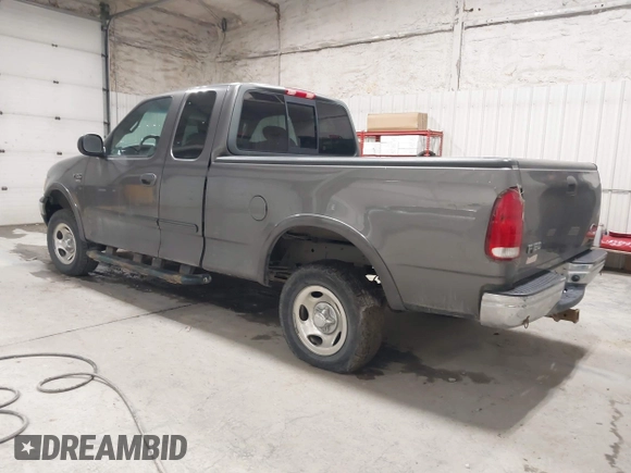 2002 Ford F-150 XL with VIN 1FTRX18W92KA81797, listed as a IAAI auction lot 42250147 with 162,918 mi miles and . Bid and sale history available at DreamBid. Image 3.