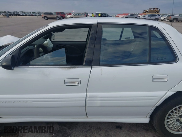 1997 Pontiac Grand Am SE with VIN 1G2NE52T3VC809661, listed as a IAAI auction lot 41100711 with 168,686 mi miles and . Bid and sale history available at DreamBid. Image 14.