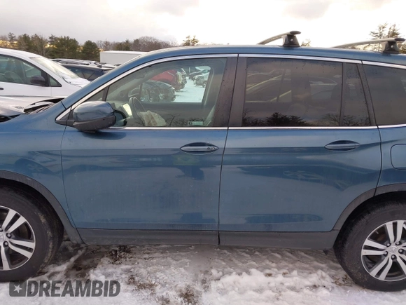 2018 Honda Pilot EX-L with VIN 5FNYF6H57JB007065, listed as a IAAI auction lot 41418432 with 123,806 mi miles. Bid and sale history available at carsss.com. Image 14.