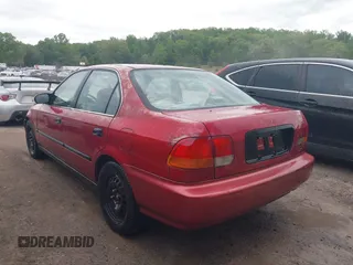 1997 Honda Civic LX with VIN 1HGEJ6672VL019621, listed as a IAAI auction lot 42081226 with 194,957 mi miles. Bid and sale history available at carsss.com. Image 3.