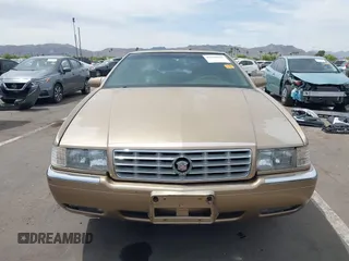 1999 Cadillac Eldorado ESC z VIN 1G6EL12Y5XU603764, wystawiony jako IAAI lot #42368692 z przebiegiem 154 613 mil mil oraz . Historia ofert i sprzedaży dostępna na DreamBid. Obrazek 12.