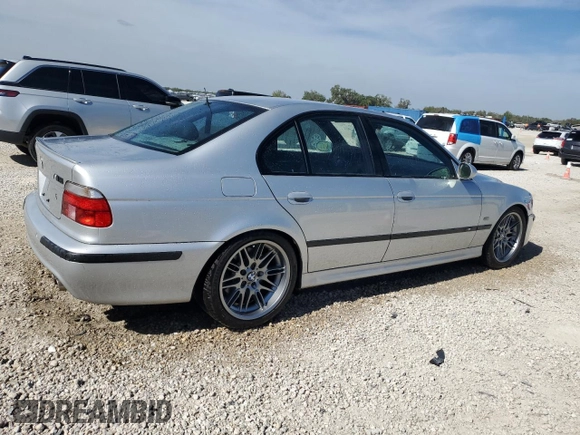 2000 BMW M5 z VIN WBSDE9342YBZ96884, wystawiony jako Copart lot #81061134 z przebiegiem 144 475 mil mil oraz Nie do naprawy • Non repairable. Historia ofert i sprzedaży dostępna na DreamBid. Obrazek 3.