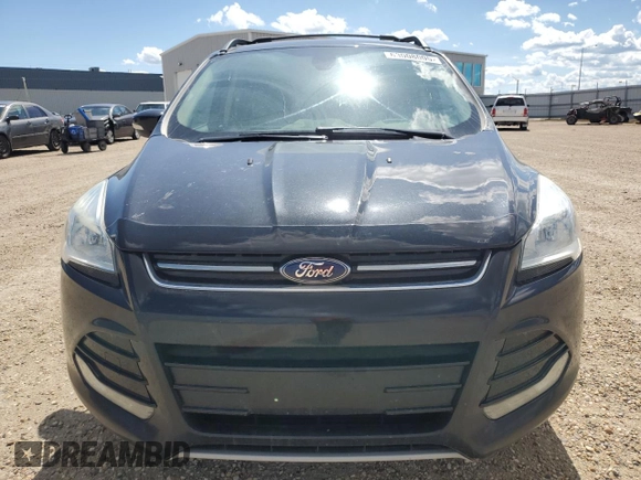 2013 Ford Escape SEL with VIN 1FMCU9H94DUA50063, listed as a Copart auction lot 63008005 with 225,421 mi miles and Salvage title. Bid and sale history available at DreamBid. Image 5.