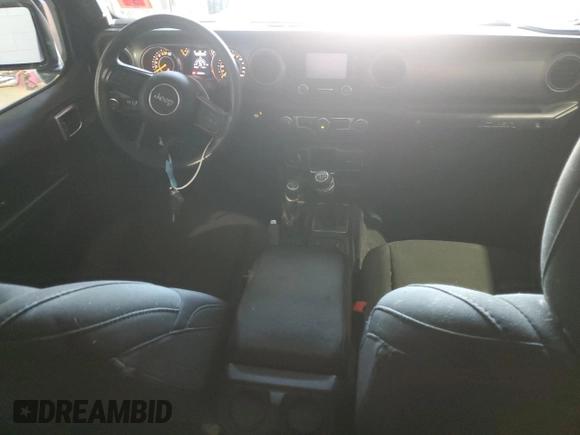 2020 Jeep Wrangler Unlimited Black and Tan with VIN 1C4HJXDG1LW267312, listed as a Copart auction lot 49658135 with 66,624 mi miles and Salvage title. Bid and sale history available at DreamBid. Image 8.