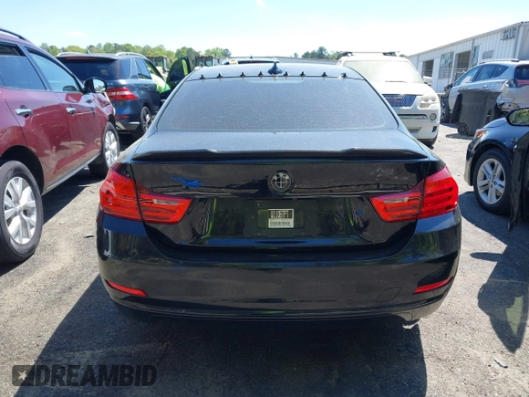 2015 BMW 4 Series 428i with VIN WBA3N7C54FK223490, listed as a IAAI auction lot 42033200 with 145,882 mi miles. Bid and sale history available at carsss.com. Image 16.