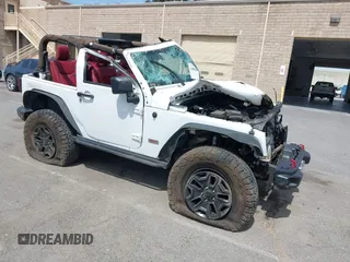2013 Jeep Wrangler Rubicon 10th Anniversary z VIN 1C4BJWCG1DL615629, wystawiony jako IAAI lot #42088946 z przebiegiem 129 854 mil mil oraz . Historia ofert i sprzedaży dostępna na DreamBid. Obrazek 1.