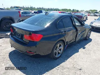 2015 BMW 3 Series 328i with VIN WBA3C1C58FK123489, listed as a IAAI auction lot 42026400 with 127,880 mi miles and . Bid and sale history available at carsss.com. Image 4.