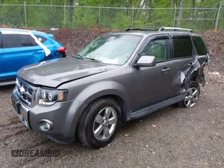 2010 Ford Escape Limited z VIN 1FMCU9EGXAKA70120, wystawiony jako IAAI lot #42330489 z przebiegiem 179 604 mil mil oraz . Historia ofert i sprzedaży dostępna na DreamBid. Obrazek 17.
