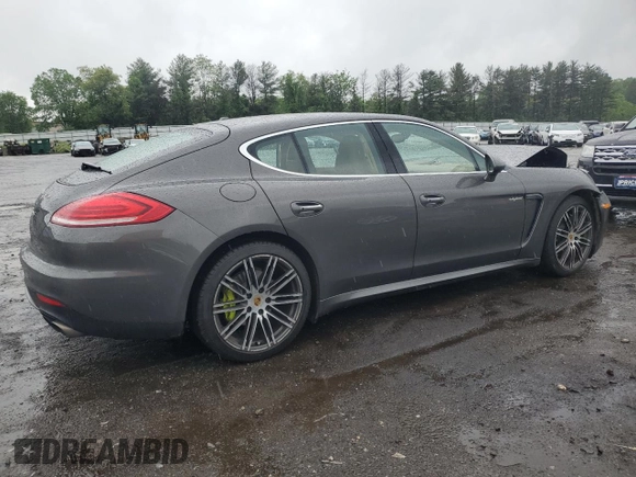 2016 Porsche Panamera S E-Hybrid z VIN WP0AD2A77GL040200, wystawiony jako Copart lot #56223035 z przebiegiem 113 659 mil mil oraz Szkody całkowita. Historia ofert i sprzedaży dostępna na DreamBid. Obrazek 3.