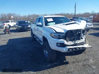 2021 Toyota Tacoma 4WD SR5 with VIN 3TYDZ5BN4MT000619, listed as a IAAI auction lot 41886686 with 91,338 mi miles. Bid and sale history available at carsss.com. Image 1.