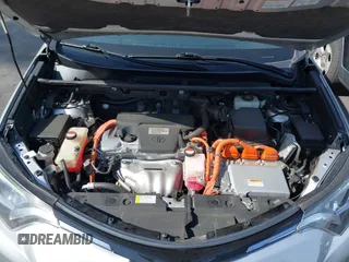 2016 Toyota RAV4 Hybrid XLE with VIN JTMRJREVXGD029019, listed as a IAAI auction lot 42021530 with 74,400 mi miles. Bid and sale history available at carsss.com. Image 10.