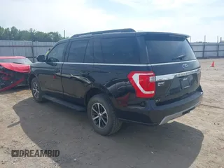 2019 Ford Expedition XLT with VIN 1FMJU1HT5KEA84864, listed as a IAAI auction lot 40174691 with 119,758 mi miles. Bid and sale history available at carsss.com. Image 3.
