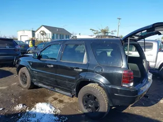 2002 Ford Escape Limited with VIN 1FMCU041X2KC74197, listed as a IAAI auction lot 41363369 with 153,704 mi miles. Bid and sale history available at carsss.com. Image 3.