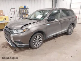 2019 Mitsubishi Outlander ES with VIN JA4AZ3A34KZ010463, listed as a IAAI auction lot 41241813 with 57,499 mi miles. Bid and sale history available at carsss.com. Image 2.