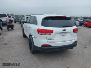 2016 Kia Sorento LX with VIN 5XYPG4A37GG055639, listed as a IAAI auction lot 41888968 with 140,431 mi miles. Bid and sale history available at carsss.com. Image 3.