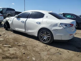 2014 Maserati Ghibli S Q4 with VIN ZAM57RTA2E1083387, listed as a Copart auction lot 53621465 with 0 mi miles and Salvage Title. Bid and sale history available at carsss.com. Image 2.