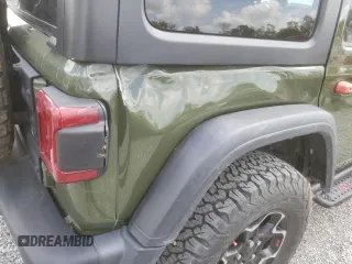 2020 Jeep Wrangler Unlimited Rubicon z VIN 1C4HJXFN9LW315814, wystawiony jako Copart lot #49147855 z przebiegiem 28 902 mil mil oraz Szkoda całkowita • Salvage title. Historia ofert i sprzedaży dostępna na DreamBid. Obrazek 13.