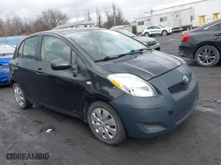 2010 Toyota Yaris with VIN JTDKT4K31A5283852, listed as a IAAI auction lot 41674971 with 197,351 mi miles. Bid and sale history available at carsss.com. Image 1.