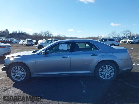 2014 Chrysler 300 C with VIN 2C3CCAKG2EH273274, listed as a IAAI auction lot 41638665 with 164,888 mi miles and . Bid and sale history available at carsss.com. Image 14.