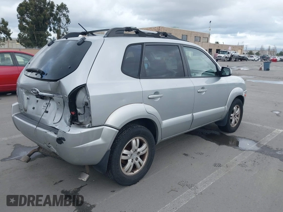 2007 Hyundai Tucson SE with VIN KM8JN12D07U670447, listed as a IAAI auction lot 41946768 with 209,079 mi miles. Bid and sale history available at carsss.com. Image 4.