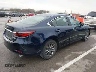 2021 Mazda 6 Sport with VIN JM1GL1UM2M1603864, listed as a IAAI auction lot 40888687 with 36,311 mi miles and . Bid and sale history available at carsss.com. Image 4.