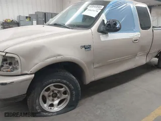 1998 Ford F-150 Standard with VIN 1FTZX18W6WKA83626, listed as a IAAI auction lot 40625179 with 343,403 mi miles. Bid and sale history available at carsss.com. Image 6.