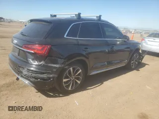 2021 Audi Q5 Premium Plus with VIN WA1BAAFYXM2015246, listed as a Copart auction lot 61257785 with 61,407 mi miles and Salvage title. Bid and sale history available at DreamBid. Image 3.