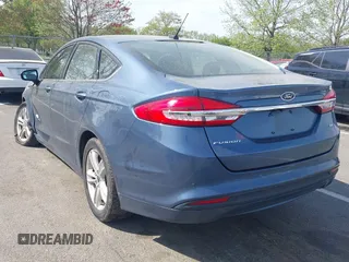 2018 Ford Fusion SE z VIN 3FA6P0H74JR176113, wystawiony jako IAAI lot #42074916 z przebiegiem 78 940 mil mil oraz . Historia ofert i sprzedaży dostępna na DreamBid. Obrazek 3.